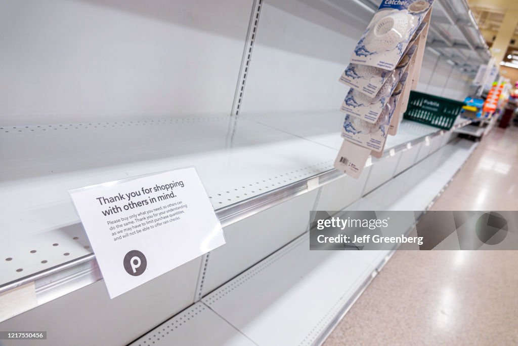 Empty Store shelves, Thank you for shopping with others in mind sign