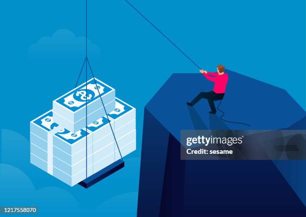 businessman slowly pulls up a lot of money from under the cliff - pulley stock illustrations