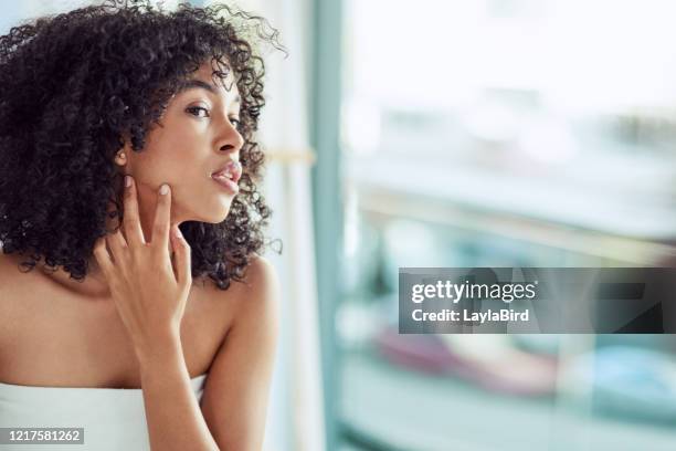 better put some moisturiser on that... - examining face stock pictures, royalty-free photos & images