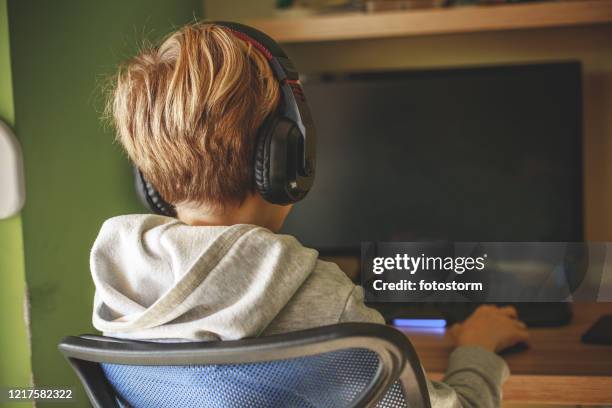 gaming championship during quarantine days - boys gaming stock pictures, royalty-free photos & images