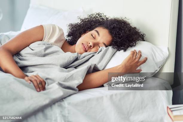 there's no time like nap time - someone sleeping in bed stock pictures, royalty-free photos & images