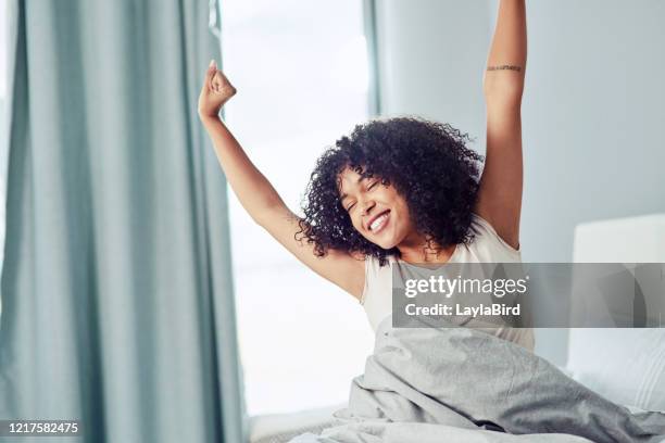 wake up, there's life to be lived! - morning bed stretch stock pictures, royalty-free photos & images