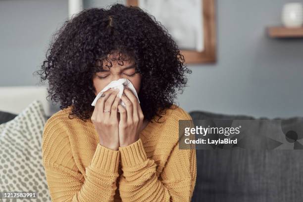 it's so much more than flu these days - blowing nose stock pictures, royalty-free photos & images