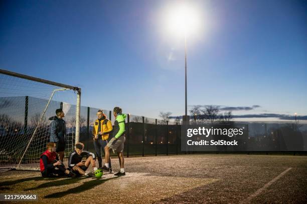 man of the match - floodlight stock pictures, royalty-free photos & images