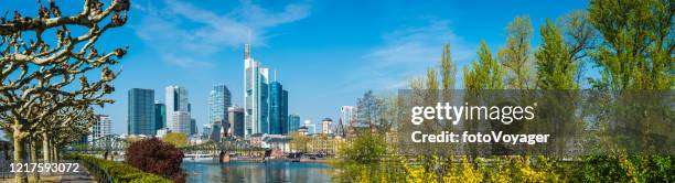 frankfurt bankenviertel financial district skyscrapers overlooking river main panorama germany - messe frankfurt stock pictures, royalty-free photos & images