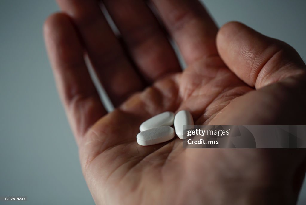 Hand with pills