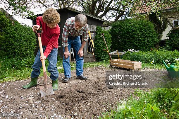 Digging With Hand Shovel Photos and Premium High Res Pictures - Getty ...