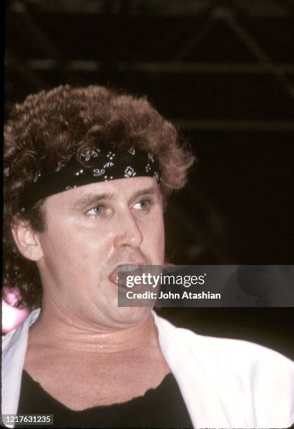 Singer Mike Reno is shown performing on stage during a "live" concert appearance with Loverboy on February 21, 1986.