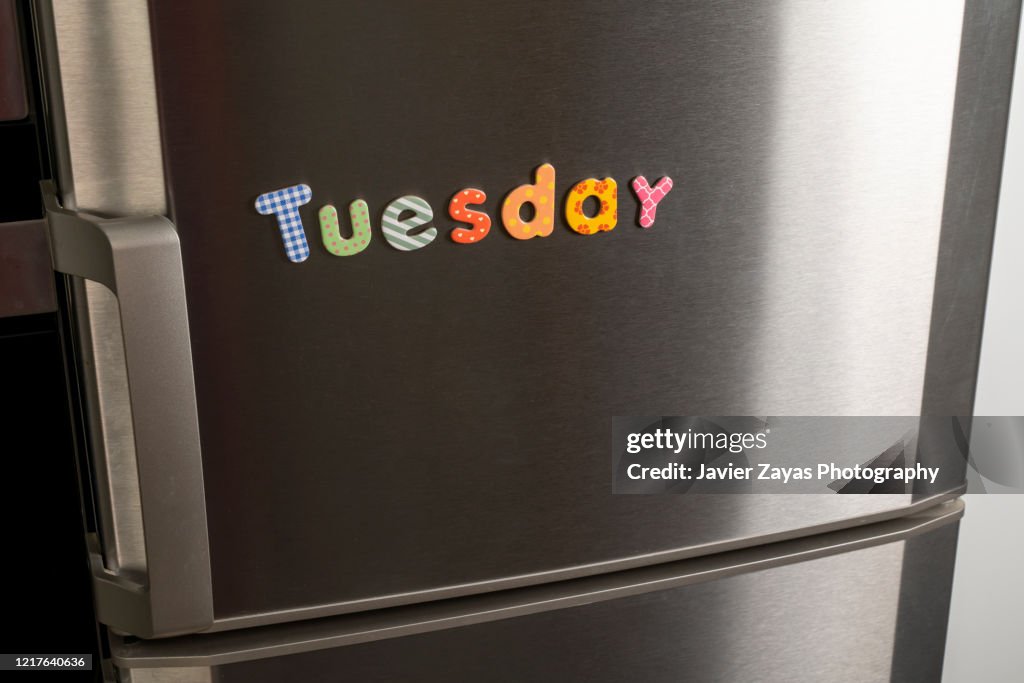 Magnetic Letters Forming the word "tuesday"