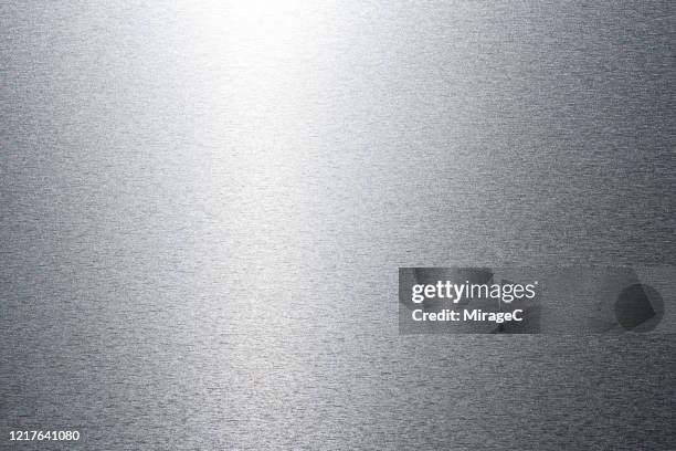 brushed metal alloy surface - titanium stock pictures, royalty-free photos & images