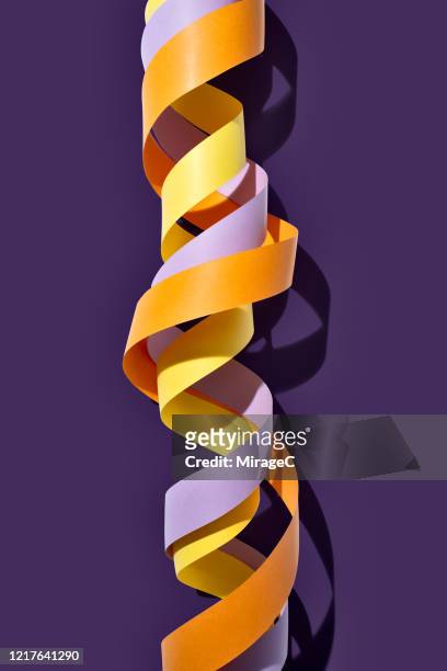 twisted color paper stripes - medical research paper stock pictures, royalty-free photos & images