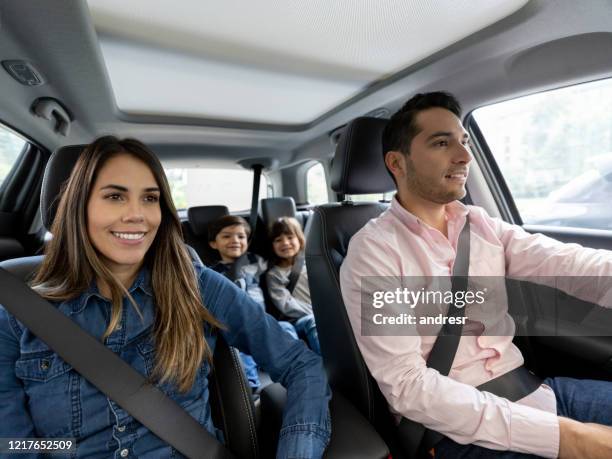 happy family going for a ride in the car - seat belt stock pictures, royalty-free photos & images