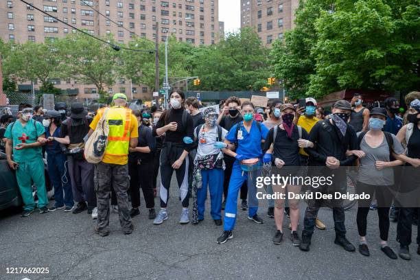 Demonstrators gather to protest the death of George Floyd at the hub the retail and restaurant heart of the South Bronx on June 4, 2020 in the Bronx...