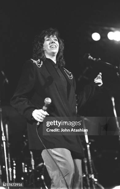 Actress and singer Mackenzie Phillips of the Mamas & the Papas is shown performing on stage during a "live" concert appearance on November 17 1989.