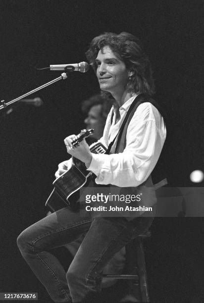 Singer, songwriter, musician, and record producer Richard Marx is shown performing on stage during a "live" concert appearance on August 16, 1992.