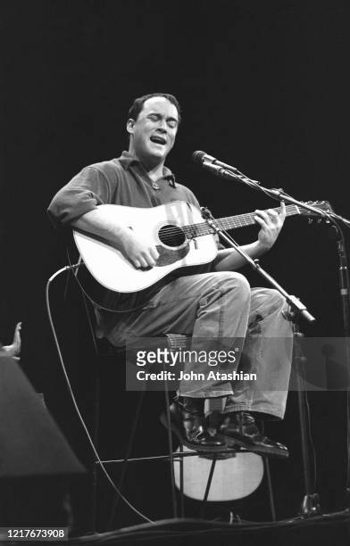 Singer, songwriter and guitarist Dave Matthews is shown performing on stage during solo and acoustic concert appearance on February 5, 1999.
