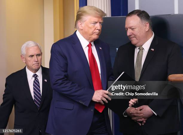 President Donald Trump arrives to speak withreporters following a meeting of the coronavirus task force in the Brady Press Briefing Room at the White...