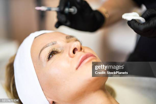 close up woman face - aesthetic medicine stock pictures, royalty-free photos & images