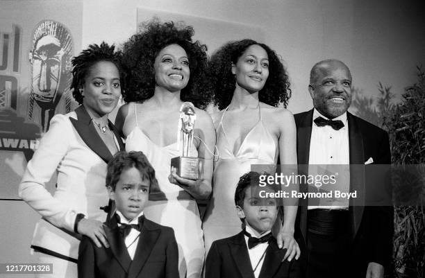 Singer Diana Ross poses for photos with daughters Rhonda and Tracee and sons Ross and Evan, and record executive, film and television producer Berry...