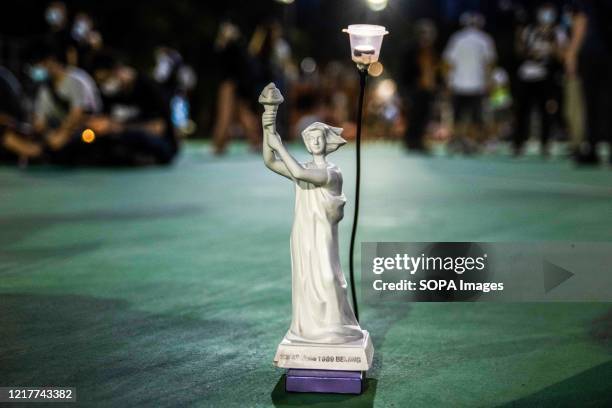 View of a miniature of the Goddess of Democracy statue created during the protests of 1989 in Beijing. Thousands gathered for the annual memorial...