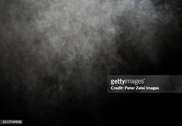 smoke with black background - nebbia foto e immagini stock