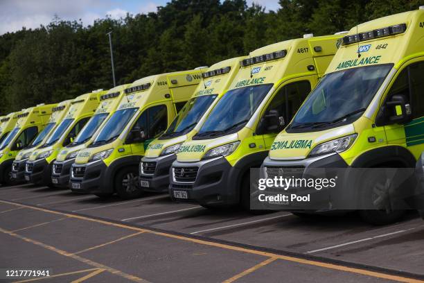 Ambulances sit parked at the Hollymore Ambulance Hub of the West Midlands Ambulance Service, operated by the West Midlands Ambulance Service NHS...