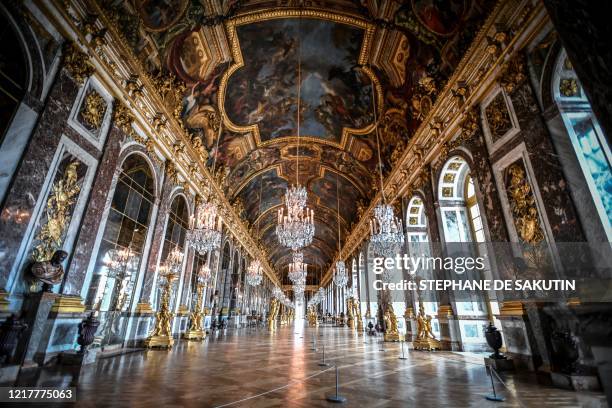 Picture taken in the Chateau de Versailles in Versailles near Paris, on June 5 shows the Galerie des Glaces on the eve of it re-opening after 82 days...
