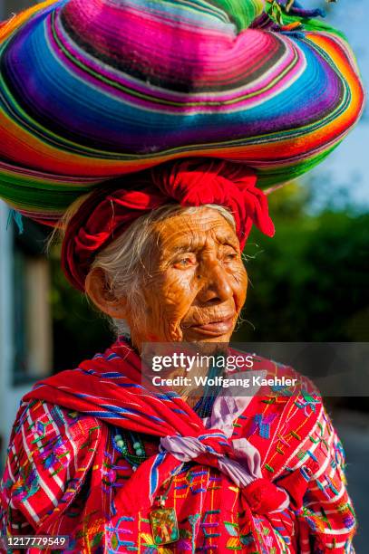 Portrait of an old Mayan woman in traditional dress in the town of Panajachel on Lake Atitlan in the southwestern Guatemalan Highlands, Guatemala.