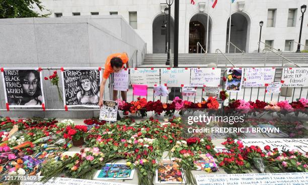 Roses are placed in front of the Hall of Justice in Los Angeles, California, on June 5, 2020 in solidarity with victims of alleged state violence...