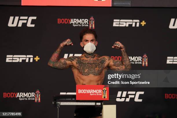 Cody Garbrandt poses on the scale during the UFC 250 weigh-in at UFC APEX on Friday, Jun 5, 2020 in Las Vegas, Nevada.