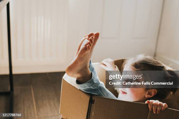 Hiding In Box Child Hiding In Box Photos and Premium High Res Pictures - Getty Images