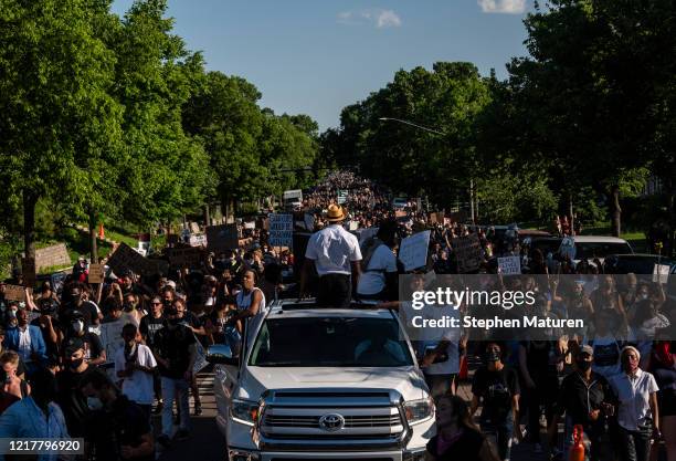 Demonstrators participate in a peaceful march against police brutality and the death of George Floyd, on June 5, 2020 in Minneapolis, Minnesota....