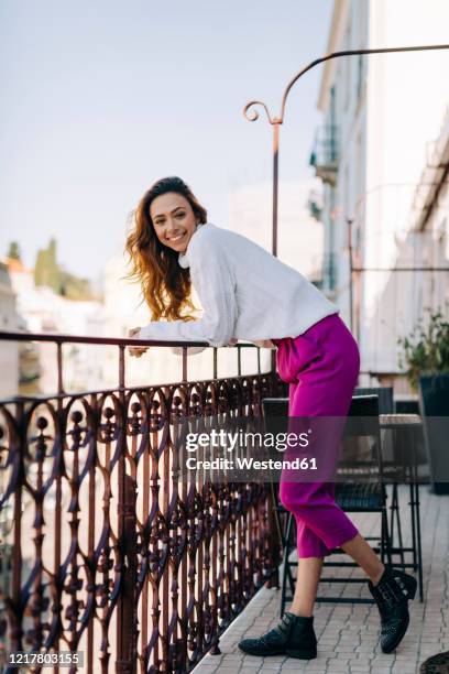 Lean On Railing 10,848 Woman Leaning On Railing Stock Photos, High-Res Pictures, and ...
