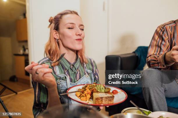 this is delicious! - refeições imagens e fotografias de stock