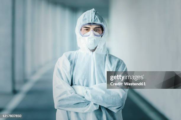 Man Using Protection Protective Suit Photos and Premium High Res Pictures - Getty Images