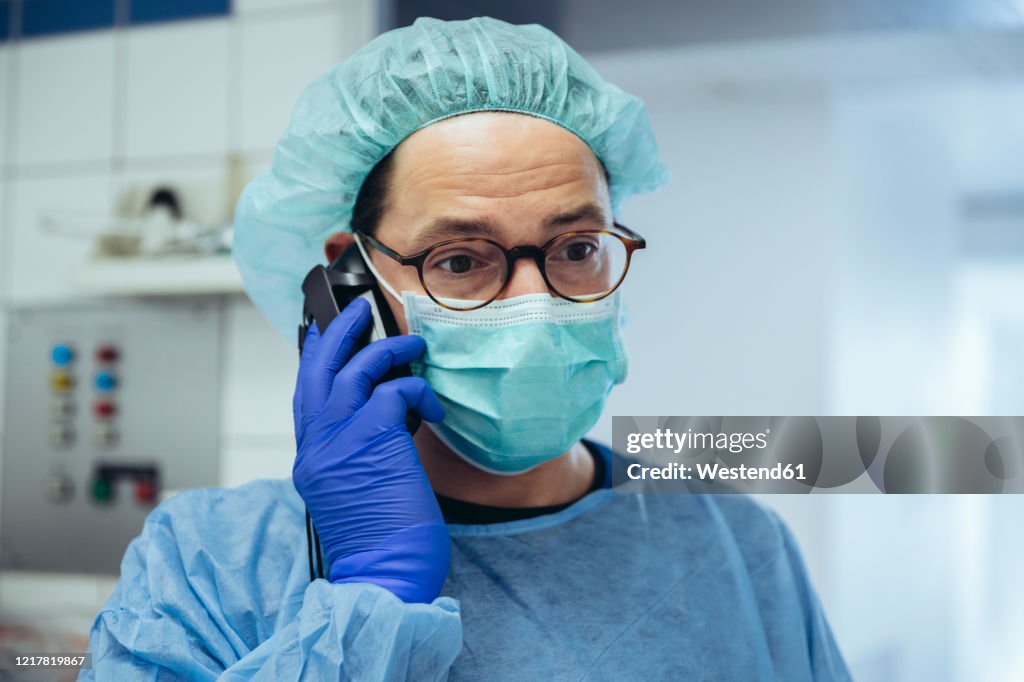 Doctors Ringing Phone Portrait Of A Doctor On The Phone In A Hospital High-Res Stock Photo ...