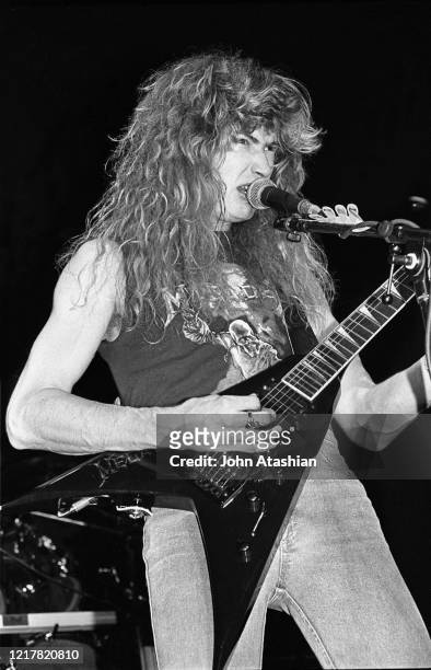 Guitarist, singer and songwriter Dave Mustaine of the heavy metal band Megadeth is shown performing on stage during a "live" concert appearance on...