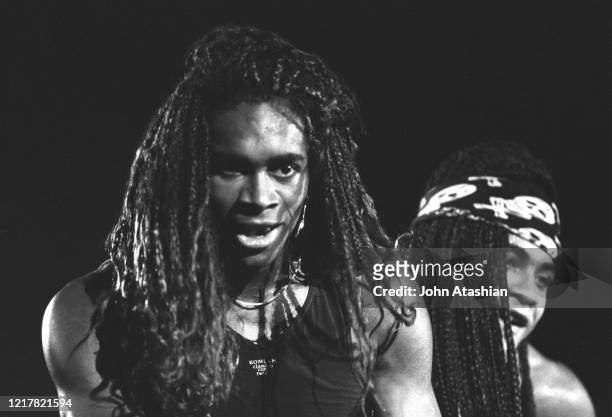 Singers Fab Morvan and Rob Pilatus are shown performing on stage during a "live" concert appearance as Milli Vanilli on July 21, 1989.