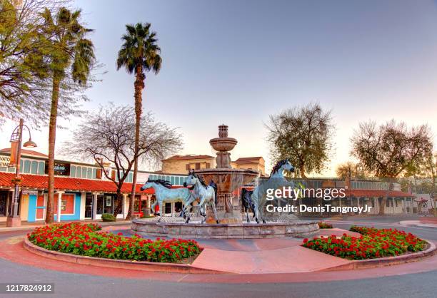 bronze horse fountain in scottsdale - scottsdale arizona stock pictures, royalty-free photos & images
