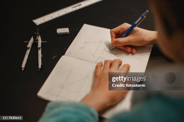 geometry tasks done by a student at home - math homework stock pictures, royalty-free photos & images