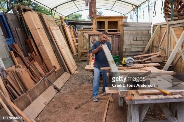 Male worker at artisanal furniture workshop