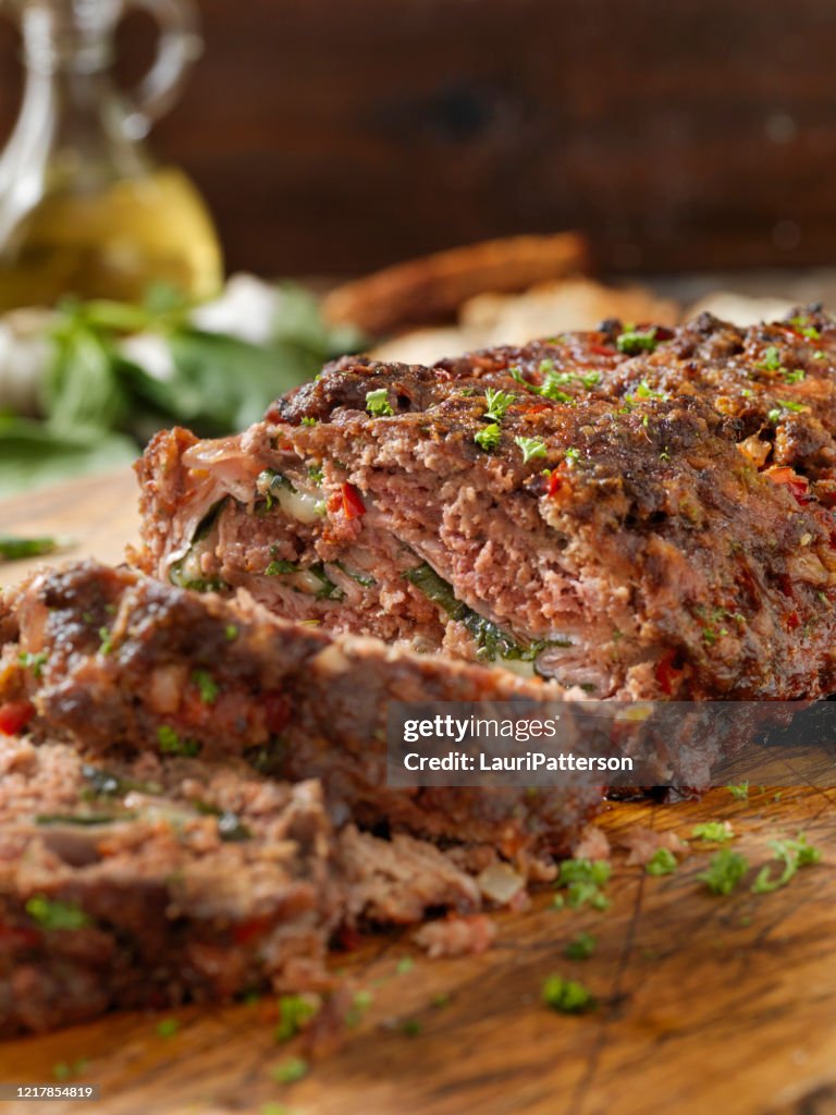 Sicilian Style Rolled Meatloaf with Deli Ham, Basil and Mozzarella