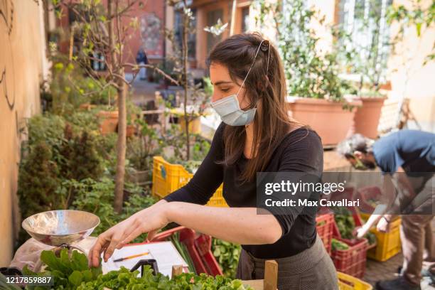 Cohousing in downtown distributes vegetables from biological farms to residents on April 09, 2020 in Bologna, Italy. There have been well over...