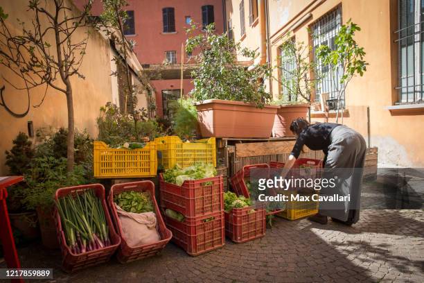 Cohousing in downtown distributes vegetables from biological farms to residents on April 09, 2020 in Bologna, Italy. There have been well over...