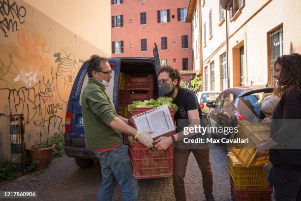 Cohousing in downtown distributes vegetables from biological farms to residents on April 09, 2020 in Bologna, Italy. There have been well over...