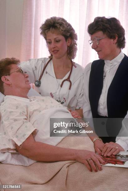 hospital patient, nurse, and nun - nun hospital stock pictures, royalty-free photos & images