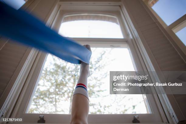 exercise at home, leg workout - striped socks stock pictures, royalty-free photos & images