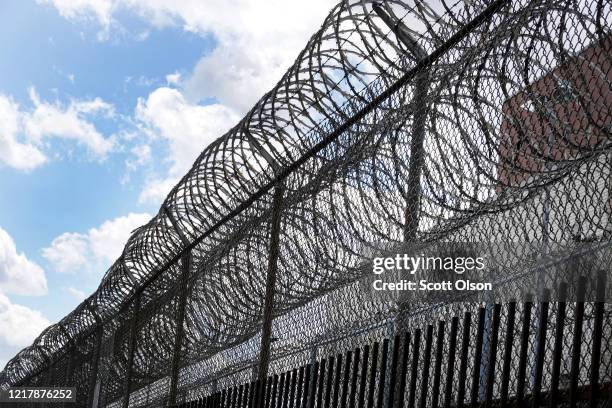 Fence surrounds the Cook County jail complex on April 09, 2020 in Chicago, Illinois. With nearly 400 cases of COVID-19 having been diagnosed among...