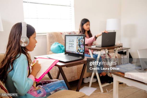 children participate in e-learning activity at home - family lockdown stock pictures, royalty-free photos & images