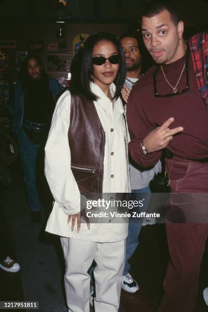 American singer and actress Aaliyah and American comedian Sinbad attend a press conference as Lifebeat's Counter AID announces its third annual...